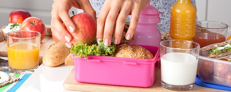 Mother is Preparing Child Lunch Box